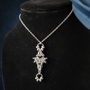 Gothic medieval witch chainmaille necklace with a small silver chain
